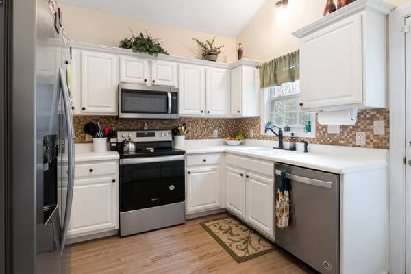 A beautiful acrylic finish kitchen in Jagatpura after renovation.